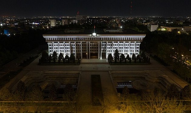 Kyrgyzstan parliamentary building at night.