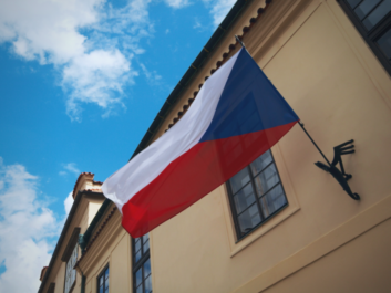 Czech flag waving from a wall