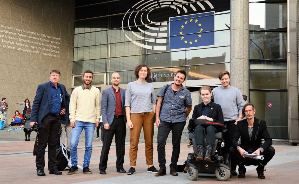 Group photo of the seven activists who met with representatives of the European Commission and members of the European Parliament.