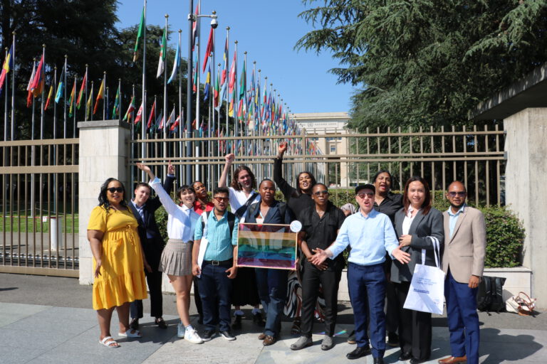 group photo of rans activists – participants of the 2025 Trans Advocacy Week – in front of the UN building in Geneva.