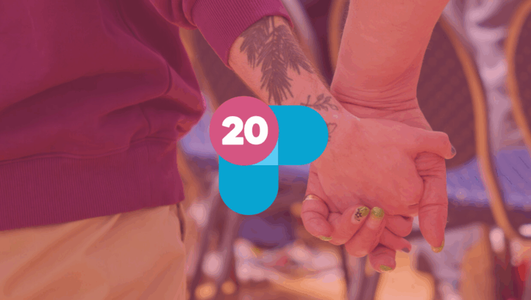 two trans people holding hands