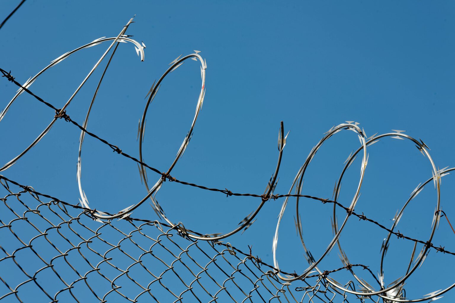 Razorwire with blue sky in the background